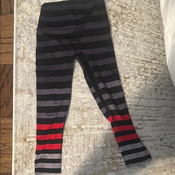 Discontinued K-DEER Black and Gray Striped workout Leggings with Bold Accents - Picture 1 of 3